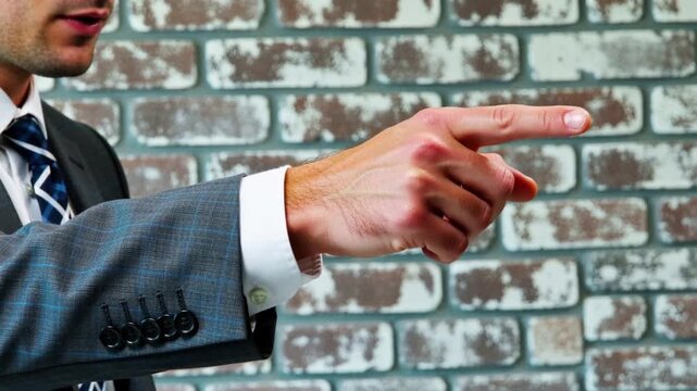 Angry Businessman Pointing Finger During Heated Argument