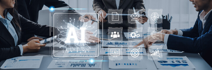 A diverse business team engages in a collaborative meeting focused on artificial intelligence, analyzing data reports and discussing strategies in a sleek office. Trope