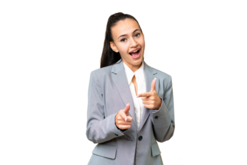 Young Arabian woman over isolated chroma key background pointing to the front and smiling