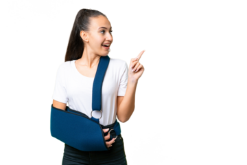 Young Arabian woman with broken arm and wearing a sling over isolated chroma key background intending to realizes the solution while lifting a finger up
