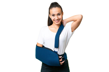 Young Arabian woman with broken arm and wearing a sling over isolated chroma key background laughing