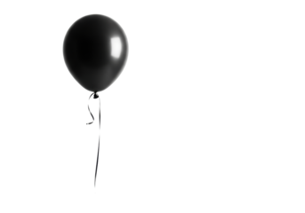 Matte black spherical helium balloon with a delicate silk ribbon floating suspended against an infinite transparent background and vast copy space. Concept of sophisticated minimalism