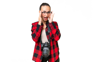 Young photographer Arab woman over isolated background with glasses and surprised