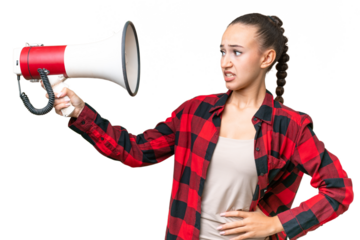 Young Arab woman over isolated background holding a megaphone with stressed expression
