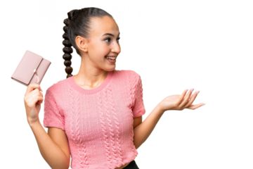 Young Arab woman holding a wallet over isolated background with surprise facial expression