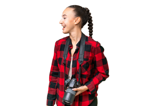 Young photographer Arab woman over isolated background laughing in lateral position - Powered by Adobe