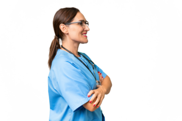 Middle-aged nurse woman over isolated background in lateral position