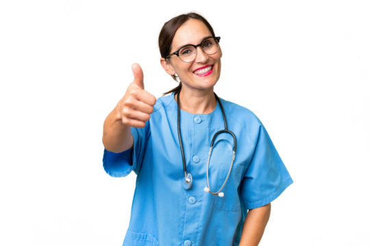 Middle-aged nurse woman over isolated background with thumbs up because something good has happened - Powered by Adobe