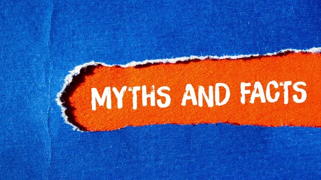 Myths and facts message writing on ripped torn paper background