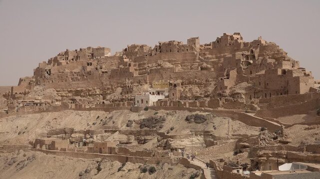 View of traditional Berber village of Takrouna, a former fortified granary known for its troglodyte housing style, in Tunisia

