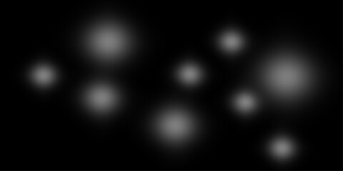 A black background with multiple soft, blurred white light orbs glowing like diffused stars or bokeh lights, creating a subtle atmospheric luminous effect