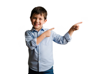 Smiling young boy in a blue shirt pointing to the right isolated on transparent background