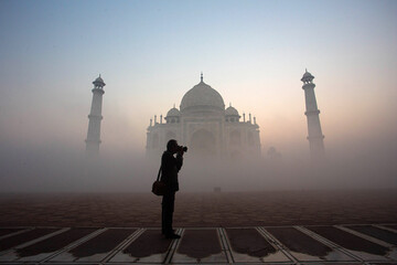 A photographer captures the misty beauty of the Taj Mahal at dawn in November, Agra, India &mdash; serene, timeless, and poetic.