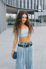 Stylish Girl Smiling Confidently Outdoors