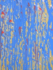 Abstract artwork with dripping blue paint on a yellow background_251207_0