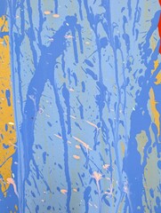 Abstract artwork with dripping blue paint on a yellow background_251207_05