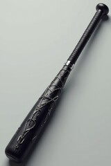 A Black Bat Adorned with Intricate Metallic Chainwork and Knots, a Striking and Unique Sports Equipment Item