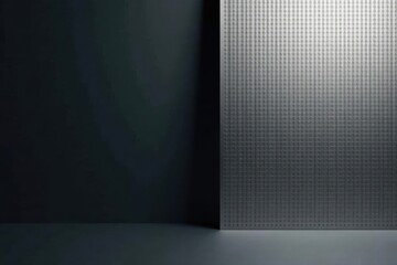 Dark Gray Textured Panel Against a Smooth Wall