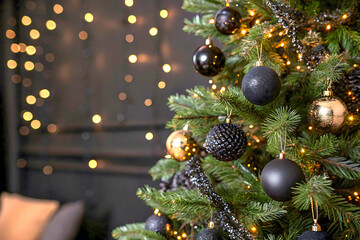 🎄 Festive gold and red ornaments decorate a green pine Christmas tree, celebrating the winter holiday season