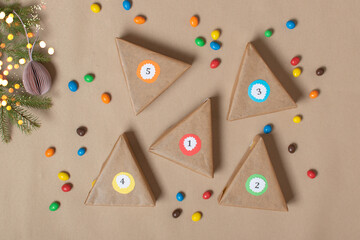 The triangles of the Advent calendar are made of thick cardboard. Step-by-step instructions. Step 8 The calendar is ready