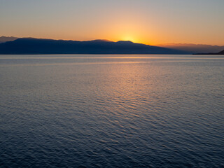 Aegean Sea at sunset at Loutra Edipsou resort on Evia Island in Greece