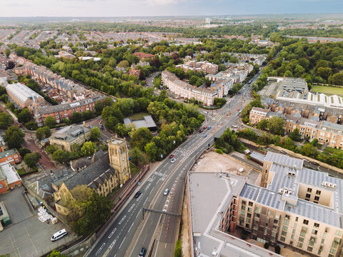 Newcastle upon Tyne: 8th August 2025: Drone view of Jesmond Road with Metro Station and Jesmond Parish Church. Westend of Newcastle skyline