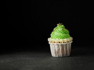 Christmas Tree Cupcake on Dark Background
