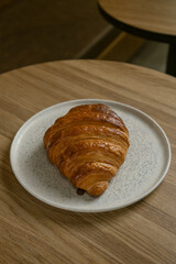 Fresh Butter Croissant on Ceramic Plate