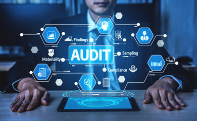A businessman interacts with a digital interface showcasing the audit process, featuring icons that represent findings, compliance, and financial analysis in a modern workspace. Tessel