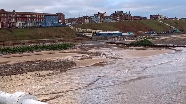 Low tide at Cromer beach on the North Norfolk Coast. Captured on a cold afternoon in December just before the light disappears