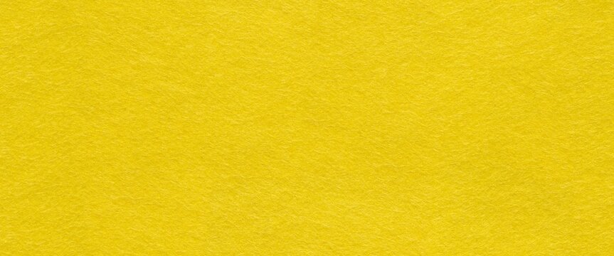 Seamless panoramic yellow felt texture.