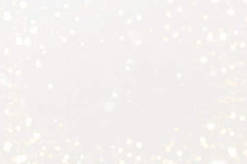 Soft white bokeh background with gentle light orbs for festive mood Demonstration Color of the Year 2026