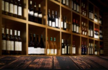 Dark Wood Table Top with Blurred Wine Bottle Shelves Background