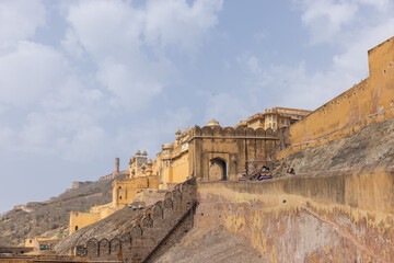Fototapeta premium Architecture view of amber fort or amer fort palace of jaipur. Amber fort is a famous tourist destination of rajasthan. Tourists from entire world travel to amber fort and witness the palace.