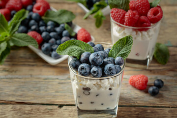 Curd dessert with berries and mint.