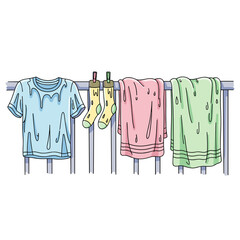 Clothes hanging on a drying rack in colorful pastel shades  