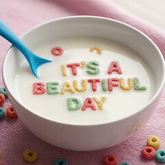 White Bowl of Milk with Colorful Letter Cereal Spelling 'It's a Beautiful Day'