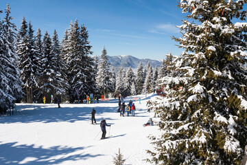 Skiing on ski resort Pamporovo in the Rhodopes mountains in Bulgaria
