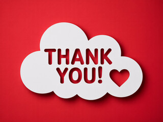 Vibrant white paper cutout saying thank you with a heart shape on bold red background for appreciation messages