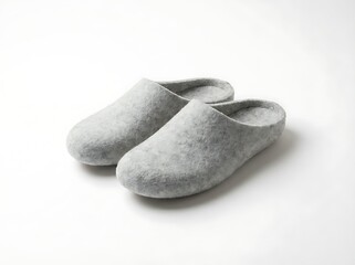 Comfortable Pair of Light Gray Felt Slippers on a White Background