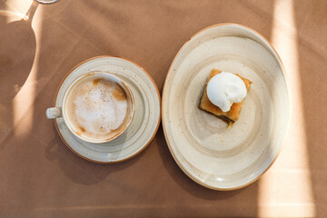Turkish baklava with ice cream and a cup of aromatic coffee.