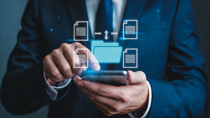 Professional businessman securely manages digital files and data transfer using a smartphone in a modern corporate setting