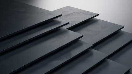 Stacked dark gray rectangular plates with subtle texture and soft lighting abstract background
