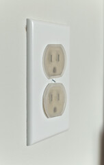 Baby Safety Device Covering Two Household Electric Outlets Securely.