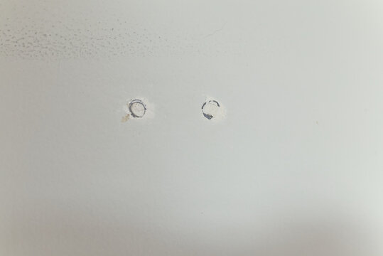 Repaired Drywall With Two Noticeable Patch Jobs.