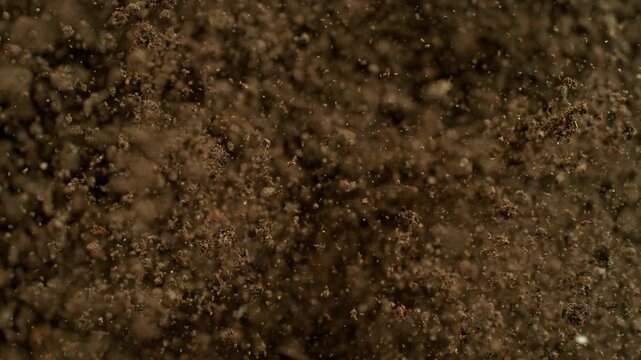 Super Slow Motion Shot of Exploding Soil Towards Camera at 1000fps.