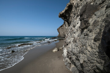 Lava bombs cemented in autoclastic breccia of the Monsul beach cliffs, volcanic complex of Cabo de Gata-Nijar Natural Park
