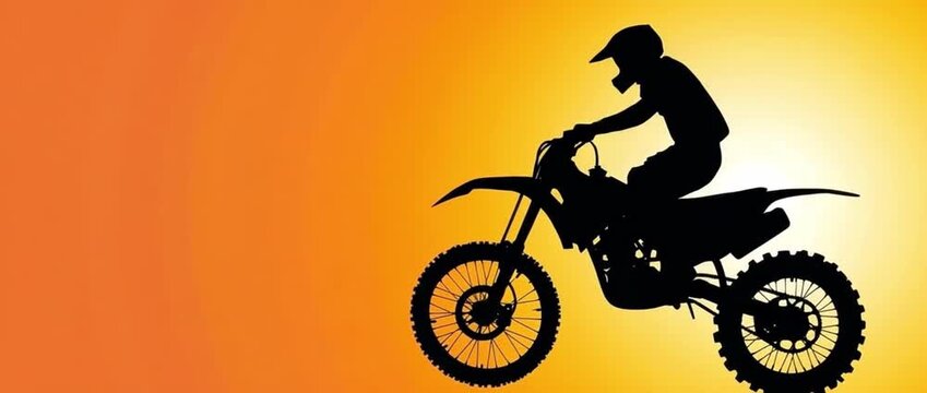 Silhouette of a motocross rider jumping a dirt bike against a bright orange and yellow gradient background