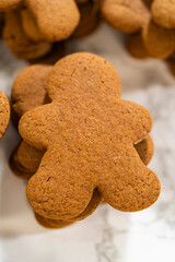 Decorating Gingerbread Man Cookies with Royal Icing for Festive Occasions