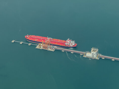Mombasa, Kenya, aerial view of Kipevu Oil Terminal 2 Jetty with a big oil vessel moored to the pier, located in Kilindini Harbour, Port of Mombasa, the biggest port in east Africa